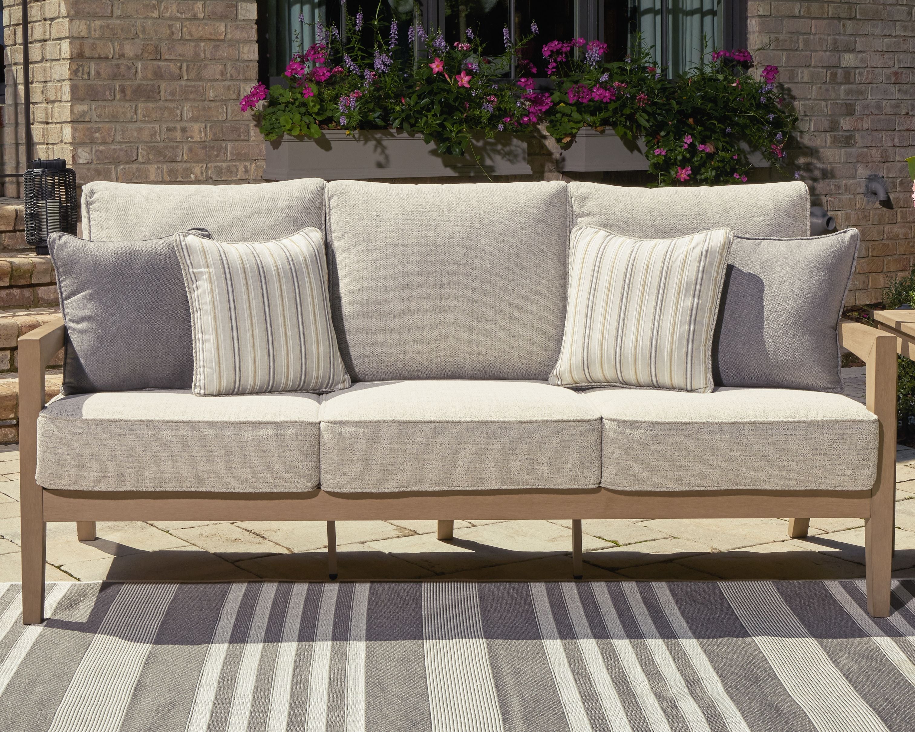 Hallow Creek - Driftwood - Sofa With Cushion - Premium Sofas from Signature Design by Ashley® - Just $2315.63! Shop now at brett interiors