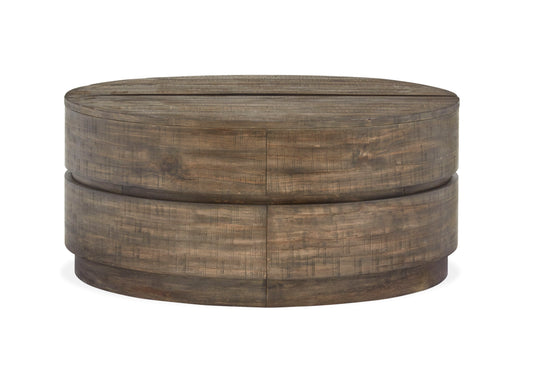 Baisden - Round Lift Top Cocktail Table With Casters - Tobacco - Premium Cocktail Tables from Magnussen Furniture - Just $1109! Shop now at brett interiors