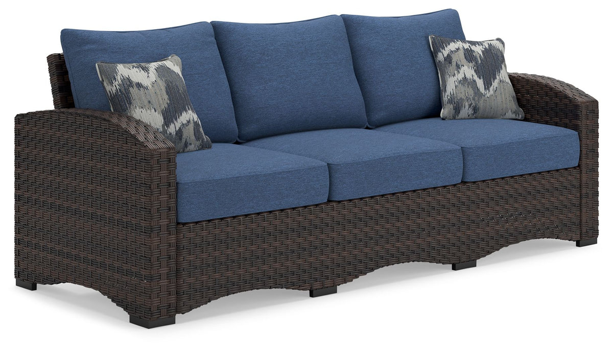 Windglow - Blue / Brown - Sofa With Cushion - Premium Sofas from Signature Design by Ashley® - Just $1130.63! Shop now at brett interiors