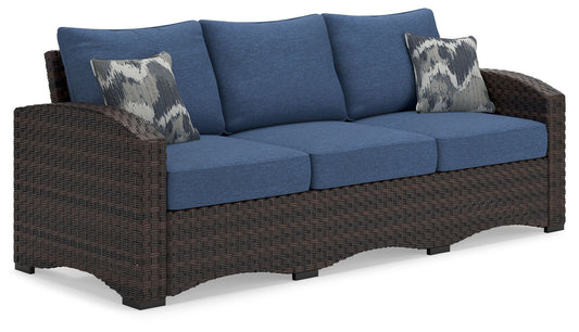 Windglow - Blue / Brown - Sofa With Cushion - Premium Sofas from Signature Design by Ashley® - Just $1130.63! Shop now at brett interiors