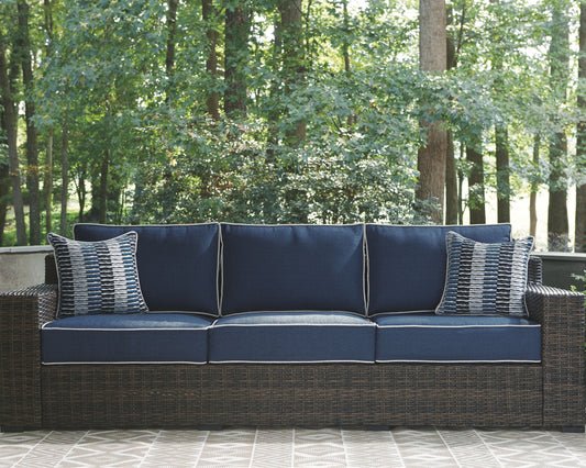 Grasson - Brown / Blue - Sofa With Cushion - Premium Sofas from Ashley Furniture - Just $1543.13! Shop now at brett interiors