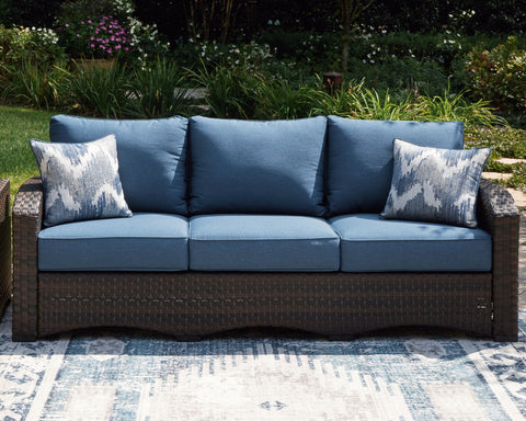 Windglow - Blue / Brown - Sofa With Cushion - Premium Sofas from Signature Design by Ashley® - Just $1130.63! Shop now at brett interiors