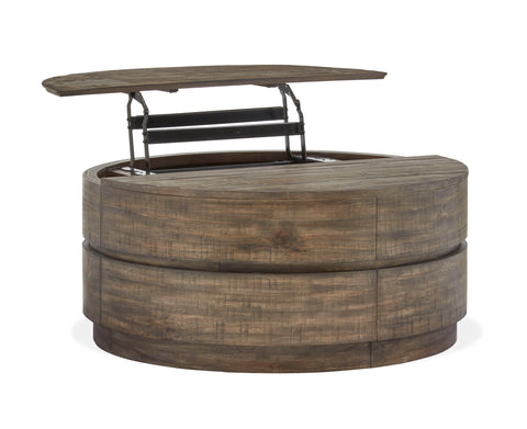 Baisden - Round Lift Top Cocktail Table With Casters - Tobacco - Premium Cocktail Tables from Magnussen Furniture - Just $1109! Shop now at brett interiors